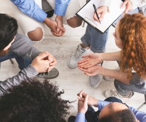 Discussion Group Concept. Diverse people discussing their problems with others seated in circle, top view